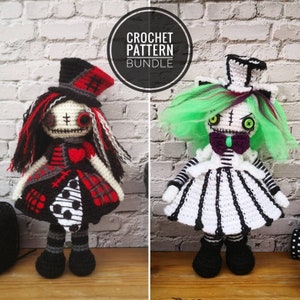 May include: Crochet pattern bundle for two dolls. The dolls are dressed in black and white striped dresses with red and black accents. One doll has green hair and the other has black and white hair. Both dolls have stitched-on eyes and mouths.