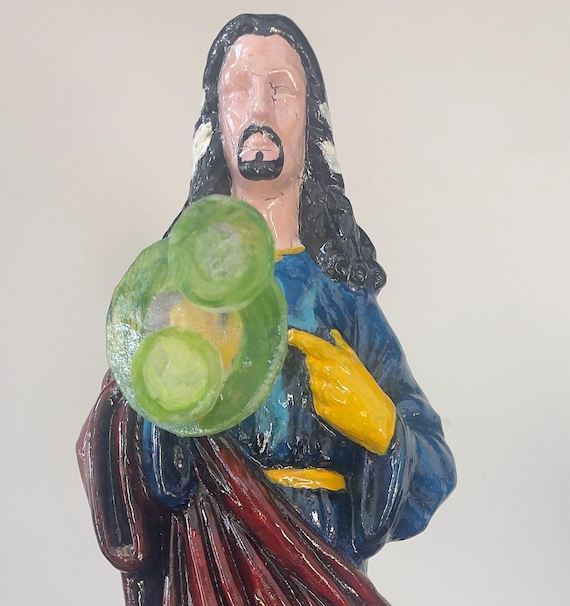 Doctor Strange reimagined as a 'Pop Religion' upcycled statue — irreverent fan art that treats Marvel with the gravity of sacred iconography.