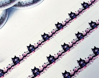 May include: Washi tape featuring a repeating pattern of black cats with pink floral accents. The cats are sitting on a vine with pink flowers and leaves.