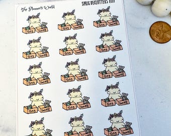 May include: A sheet of 12 stickers featuring a cartoon character with a flower crown holding two boxes labeled "Toss" and "Donate".