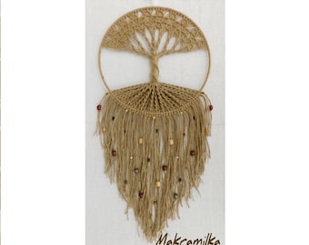 May include: A handcrafted macrame wall hanging featuring a tree design. The natural fiber artwork has a circular frame with a detailed tree silhouette. Long, fringed strands hang below, adorned with wooden beads. The text "Makramilka" is at the bottom.