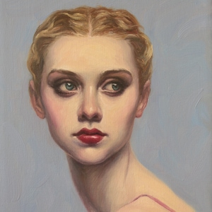May include: A painting of a woman with blonde hair and blue eyes. She is wearing a pink strap and looking to the left. The background is a light blue.