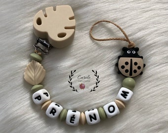 Attache tétine personnalisé en silicone (lettre prénom, clip et motif, perle ronde et lentille) coccinelle + feuille, kaki clair et beige