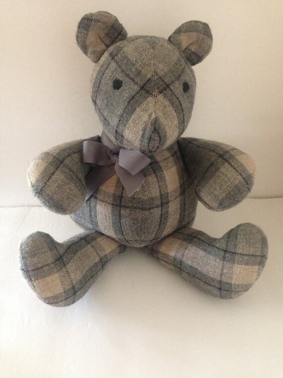 teddy bear with stitched eyes
