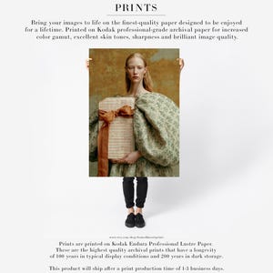 Sidonie shown as a large unframed fine art paper print held by a person to demonstrate approximate artwork size and portrait scale.