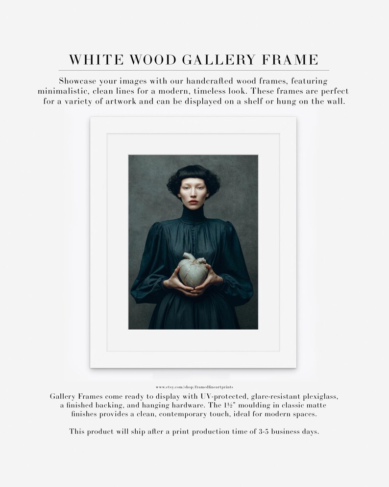 Portrait of Sable framed in a white wood gallery frame with matte, featuring soft light and emotional depth with her ceramic heart centerpiece.