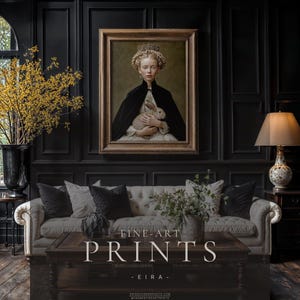 Eira framed fine art print displayed in antique gold frame on black paneled wall above cream tufted sofa in a dark academia living room