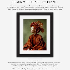 surreal female portrait wall art displayed in black wood gallery frame