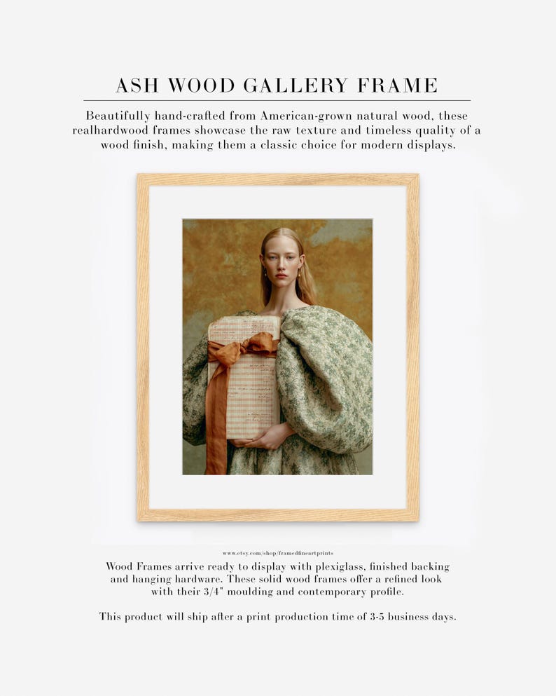 Sidonie portrait displayed in a natural ash wood gallery frame with wide white matting and a soft sage, cream, rust, and ochre palette.