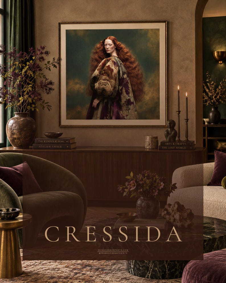 Large framed Cressida portrait displayed above a walnut console in a warm old-world modern interior with green, plum and bronze accents.