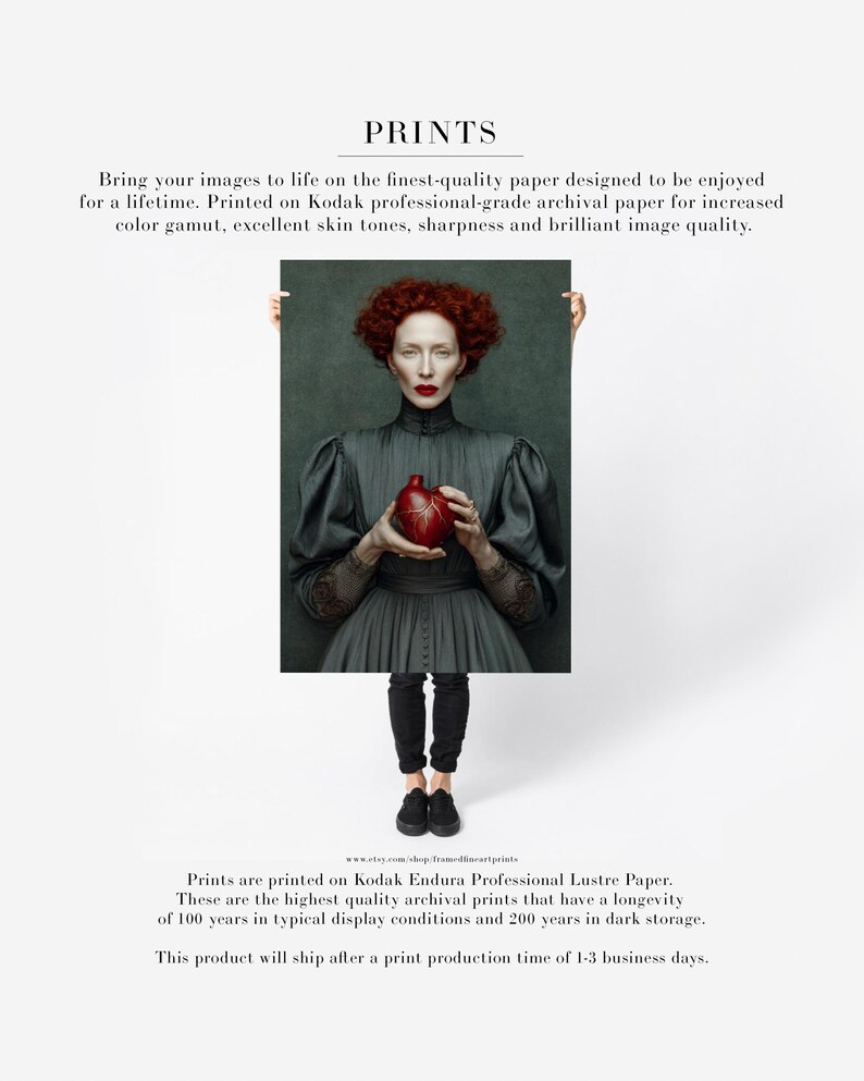 Fine art paper print of Cinder, featuring a woman in dark vintage clothing holding a vivid red heart, printed with archival inks and designed for timeless wall presentation.