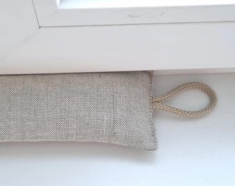 Fensterdichtung aus Buchweizenschalen und natürlichem Leinen – Zugluftstopper