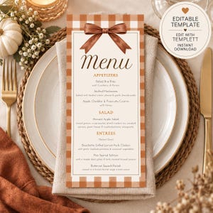 May include: A vertical menu card featuring a brown and white gingham border, a brown ribbon graphic at the top, and printed text listing appetizers, salads, and entrees. The card includes a circular badge stating Editable Template, Edit with Templett, and Instant Download.