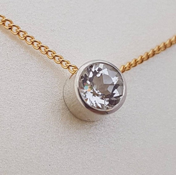 9ct White Gold and Moissanite Pendant on a Yellow Gold Chain. Gift