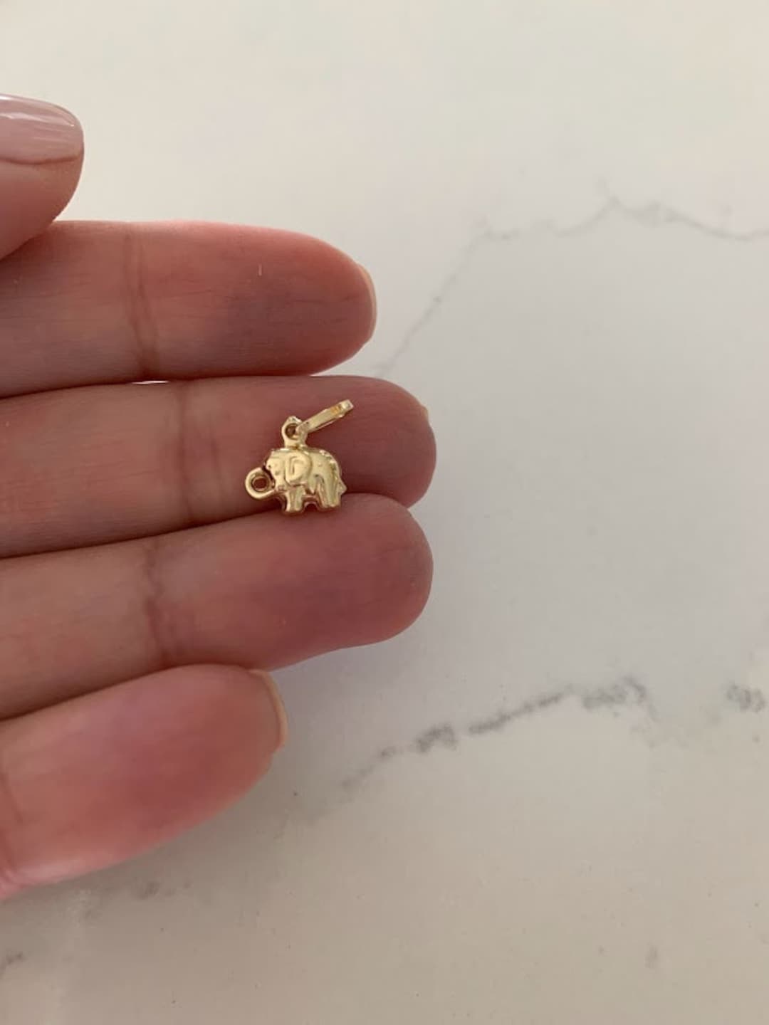 Solid gold elephant pendant sale