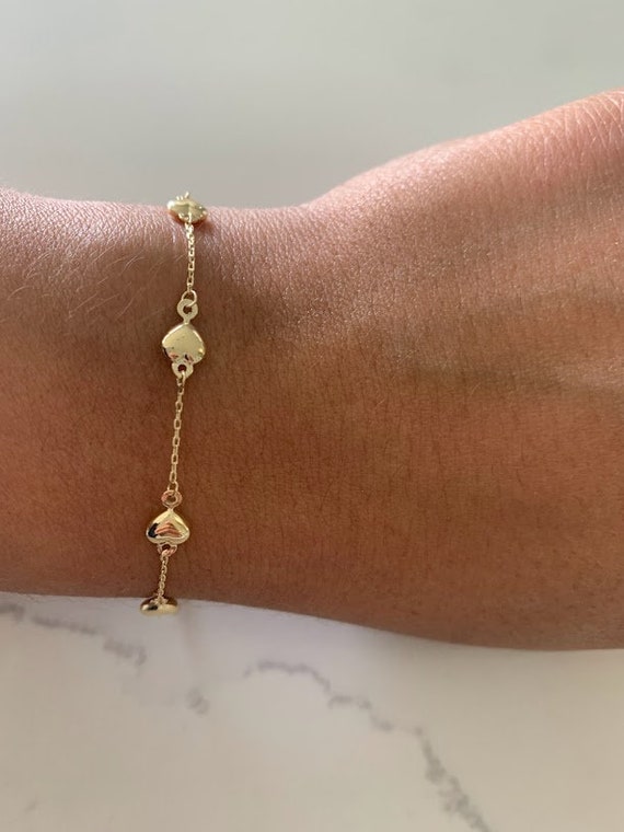 14k Yellow Gold Twine Rope With A Dangling Heart Charm Band