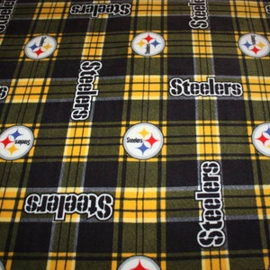 May include: Black and yellow plaid fabric with the Pittsburgh Steelers logo and the word "Steelers" repeated throughout.