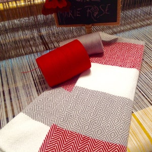 White, red and grey dishcloth, 100% cotton, entirely handwoven using traditional methods on a loom.