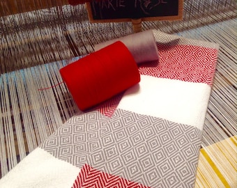White, red and grey dishcloth, 100% cotton, entirely handwoven using traditional methods on a loom.