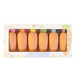 May include: A set of six carrot-shaped markers in a white box with a bunny in a garden illustration. The markers are orange with pastel-colored tops and the text "6 carrot markers" and "6 marqueurs de carottes" is printed on the box.
