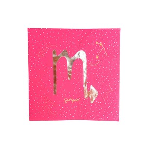 May include: A square, hot pink paper napkin with a silver foil Scorpio symbol in the center. The word "Scorpio" is printed in gold script below the symbol. White dots and gold constellation designs are scattered across the napkin.