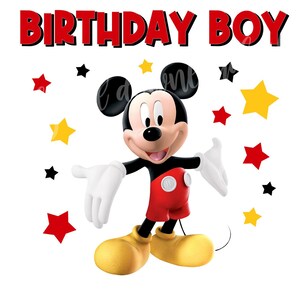 May include: A red and black cartoon character with large ears and a big smile. The character is surrounded by yellow and red stars. The text "BIRTHDAY BOY" is at the top of the image.