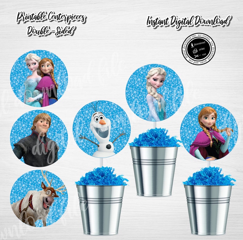May include: Printable Frozen themed centerpieces for a party. The centerpieces feature images of Elsa, Anna, Olaf, Kristoff, and Sven. The images are printed on round, double-sided circles. The circles are meant to be attached to sticks and placed in buckets filled with blue tissue paper.