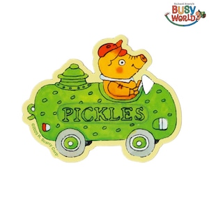 May include: A green toy car with the word "PICKLES" on the side. A yellow pig with a red hat is driving the car. The car has a green roof and white wheels. The copyright information "©2023 R. Scarry Corp." is printed on the bottom of the car.