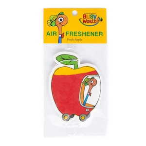 May include: A red apple shaped car air freshener with a yellow top and a green leaf. The car has a worm driving it and the text "Richard Scarry's Busy World" and "Air Freshener" are on the packaging. The scent is "Fresh Apple".