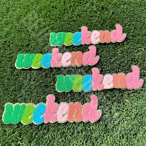 May include: Four colorful "weekend" patches with a fuzzy texture. The patches are green, blue, pink, and orange.