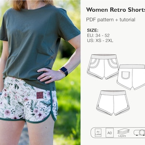 May include: A PDF sewing pattern for women's retro shorts. The pattern includes instructions for sizes EU 34-52 and US XS-2XL. The image shows a woman wearing a green t-shirt and floral shorts, along with a line drawing of the shorts.