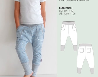 May include: Blue harem pants with a grey waistband and grey ankle cuffs, featuring side pockets. The text reads: Blue harems, PDF pattern + tutorial, SIZE KIDS: EU: 80 - 140, US: 12m - 10y. Includes A4 Letter, A0, Layers, and projector file icons.