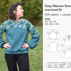 Könnte beinhalten: Ein tealblauer Pullover mit einem grünen und gelben Blatt-Muster an den Schultern und Ärmeln. Der Pullover hat eine lockere Passform und übergroße Ärmel. Der Text "Cosy Sleeves Sweater oversized fit" ist in schwarzer Schrift auf hellgrünem Hintergrund geschrieben. Der Text "PDF pattern + tutorial" ist in schwarzer Schrift auf hellgrünem Hintergrund geschrieben. Der Text "SIZE: EU: 30 - 54 US: XXS - 2XL" ist in schwarzer Schrift auf hellgrünem Hintergrund geschrieben.
