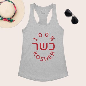 May include: A heather grey racerback tank top featuring a red graphic print that reads 100% in a circular arrangement, with the Hebrew word for Kosher in the centre and the English word KOSHER printed in a curved line underneath the Hebrew text.