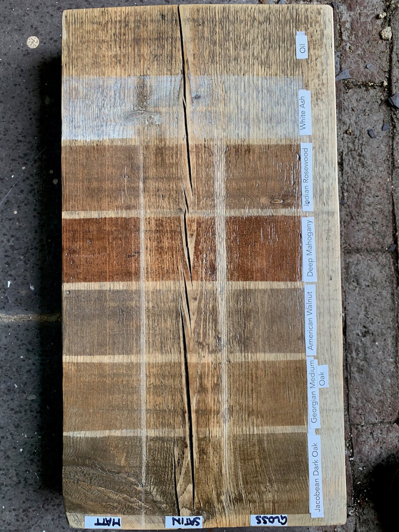 May include: Wood stain color chart with different wood types and finishes. The chart shows the colors of Jacobean Dark Oak, Georgian Medium Oak, American Walnut, Deep Mahogany, Indian Rosewood, White Ash, and Oil.