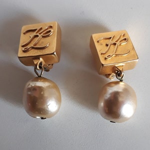gold vintage chanel earrings pearl