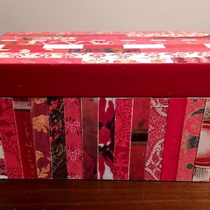 Decorative red box, striped, collaged with vintage and recycled papers