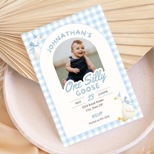 Planning a One Silly Goose first birthday? This silly goose invite is perfect for a goose first birthday, boy goose birthday, goose 1st birthday or boy silly goose party theme. Personalize this One Silly Goose birthday invitation with your child’s photo and party details for an easy printable invite. Perfect for parents searching silly goose birthday ideas, blue gingham birthday decor, first birthday boy themes, goose party decorations and unique 1st birthday invitations.