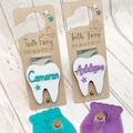Tooth Fairy personalized door hanger gift with money slot, keepsake bottle and velvet pouch.