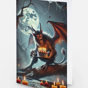 May include: Greeting card featuring a fantasy illustration of a horned demon with red eyes and wings, holding a birthday cake with lit candles. The scene is set in a dark forest under a full moon, with additional candles in the foreground.