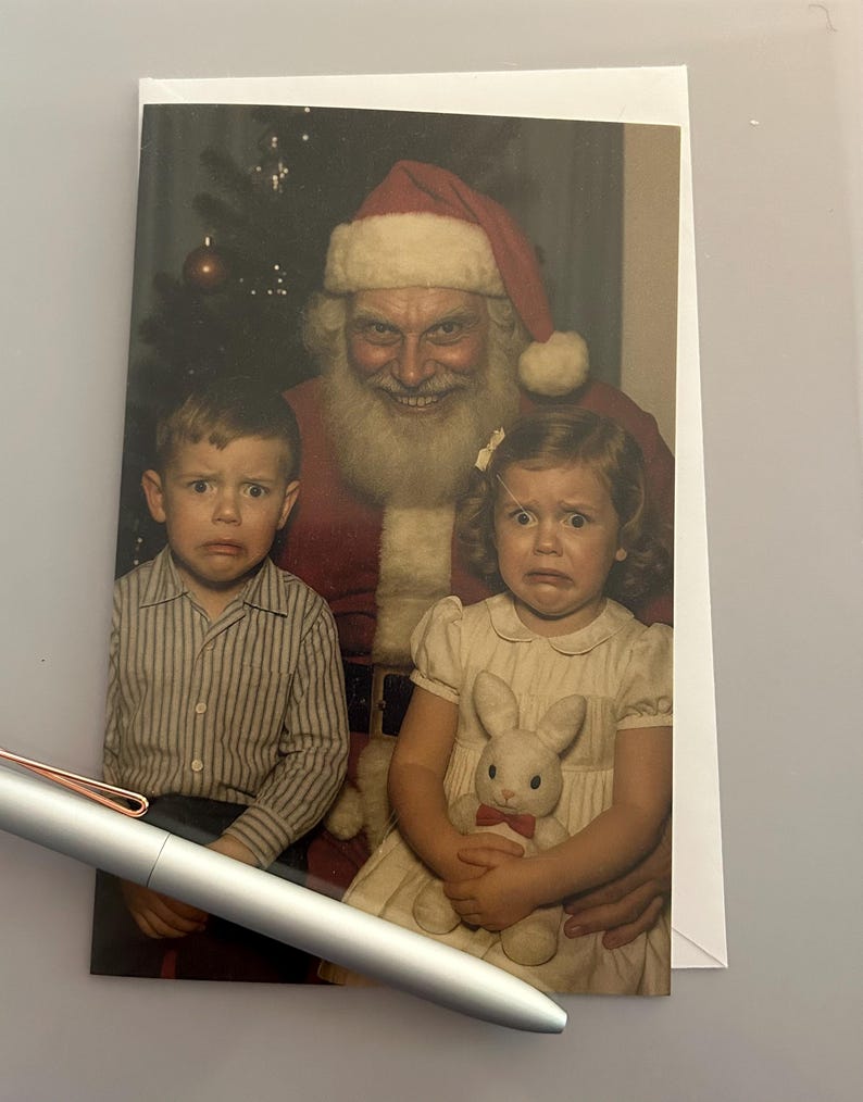May include: A vintage Christmas card featuring Santa Claus with two children, all displaying expressions of fear. The children are dressed in a striped shirt and a white dress, and the girl is holding a stuffed bunny. Santa wears a red suit and hat.