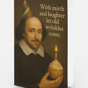 May include: A greeting card featuring a portrait of William Shakespeare wearing a colorful striped party hat, holding a cupcake with a single lit candle. The text on the card reads, With mirth and laughter let old wrinkles come.