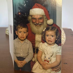 May include: A set of three ceramic mugs with a speckled, matte finish. The mugs are in shades of cream, light brown, and dark brown. Each mug has a simple, minimalist design, perfect for coffee or tea.