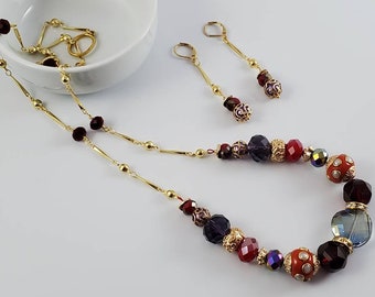 Crystal Passion is a necklace and earrings set featuring JJB beads and Chain Reaction.