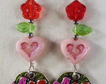 Whimsical Garden Heart Earrings – Pink Glass Hearts, Red Flower Beads & Hand-Painted Enamel Charms