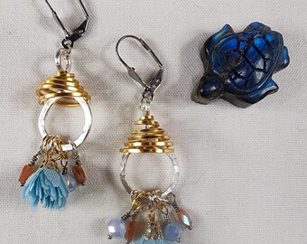 Handmade Boho Tassel Earrings with Gold Spiral Accents. Boho vibes in every swing.