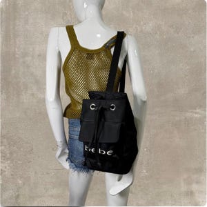 Vintage Y2K Bebe Sport Black Satin Logo Print Bungee Backpack bebe | Bags | Bebe Black Leather Backpack | Poshmark main image 2