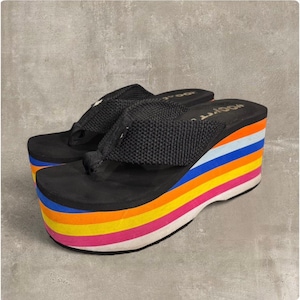 May include: A set of three ceramic mugs with a speckled, matte finish. The mugs are in shades of cream, light gray, and dark gray. Each mug has a simple, minimalist design, perfect for coffee or tea.