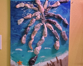 Hand crafted wooden wall decoration, inspired by the beach with shells and rocks from Flagler Beach