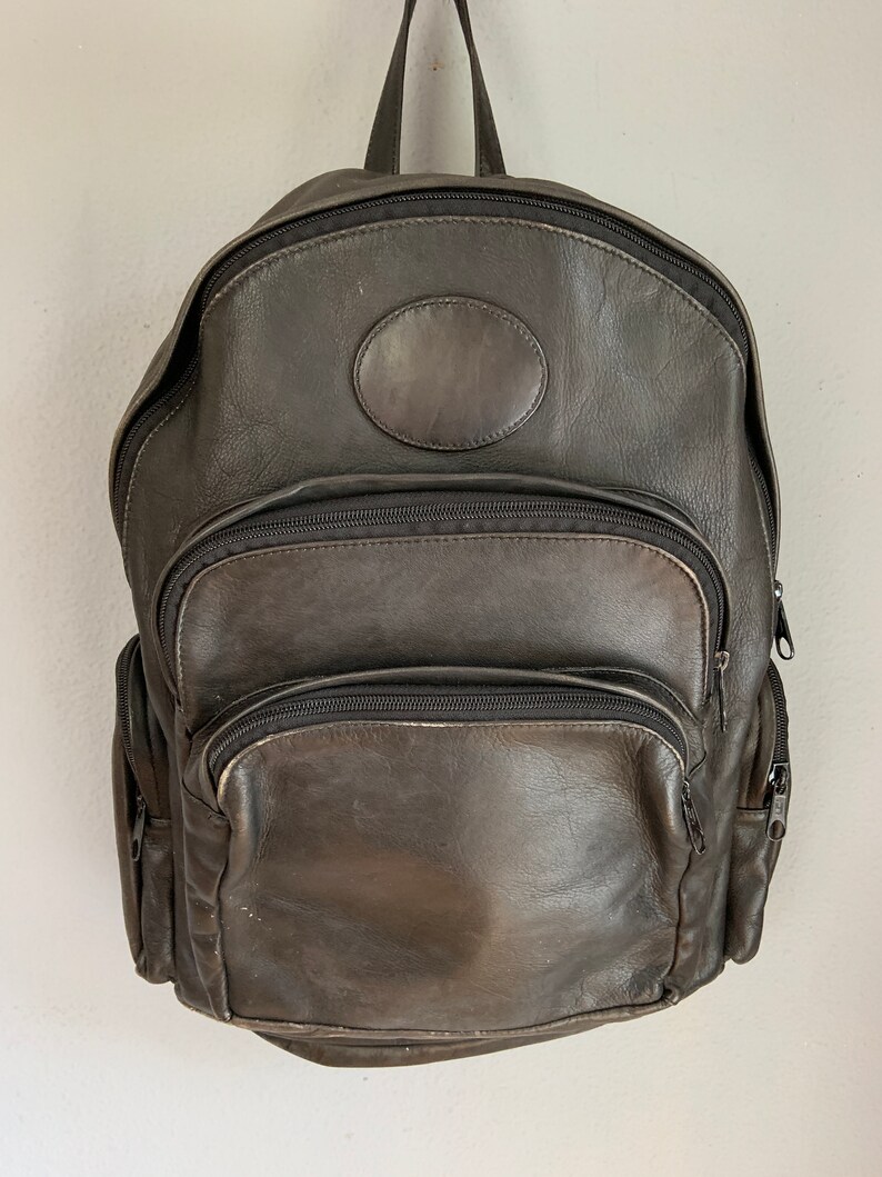 unisex scuffed burgundy interior masculine made in Canada Vintage black leather backpack thick leather organic lived in look